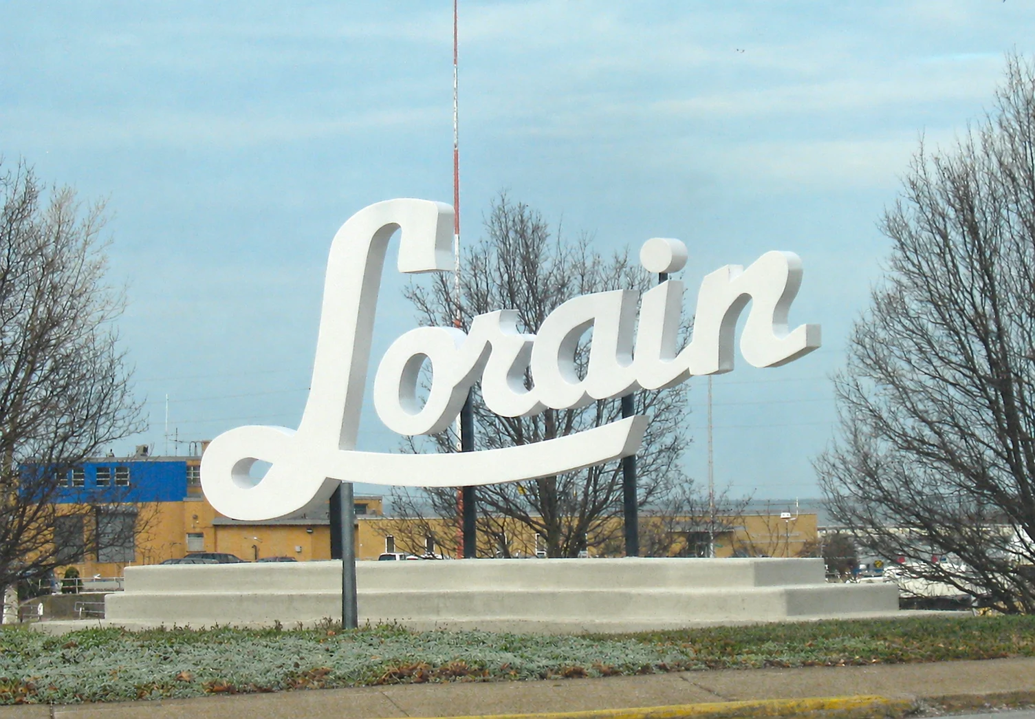 The white script Lorain sculpture in downtown Lorain